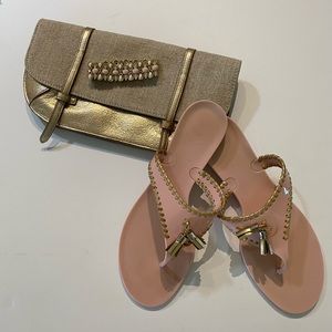 Jack Rogers pink jelly thong/flip flop with gold trim.